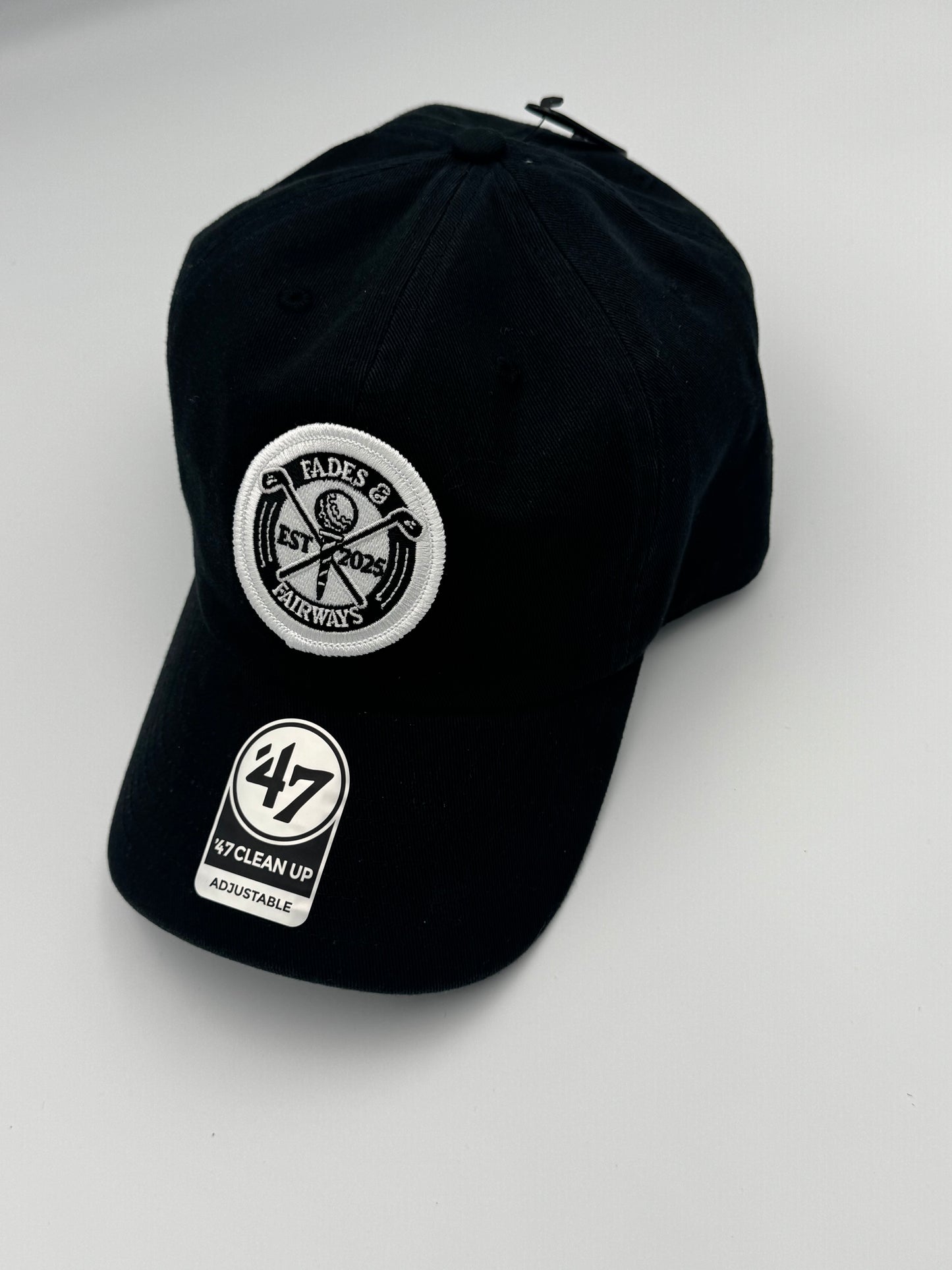 Fades & Fairways ‘47 Clean Up Hat – Black & white logo